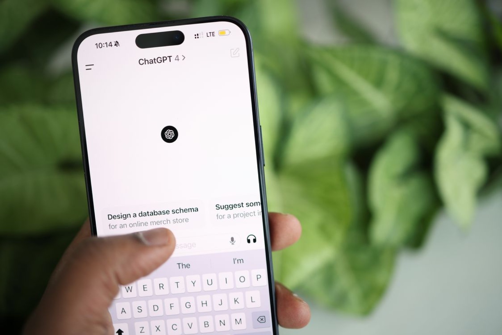 A buyer asking ChatGPT for supplier recommendations on their phone